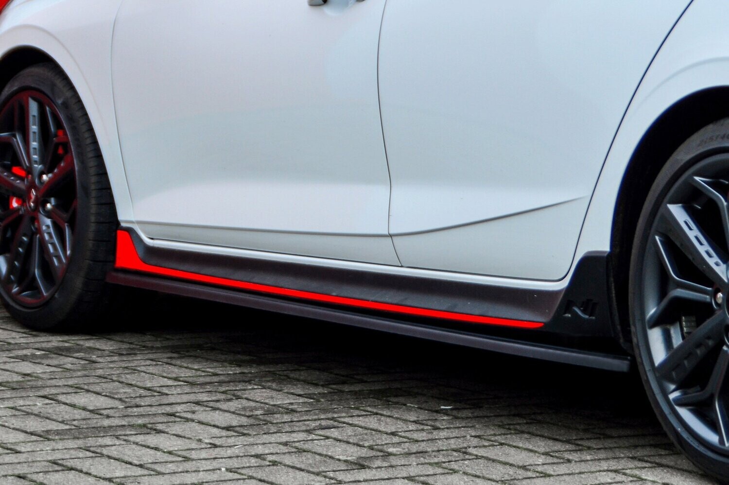 Zijskirts met vleugel achterkant Hyundai I20N Performance